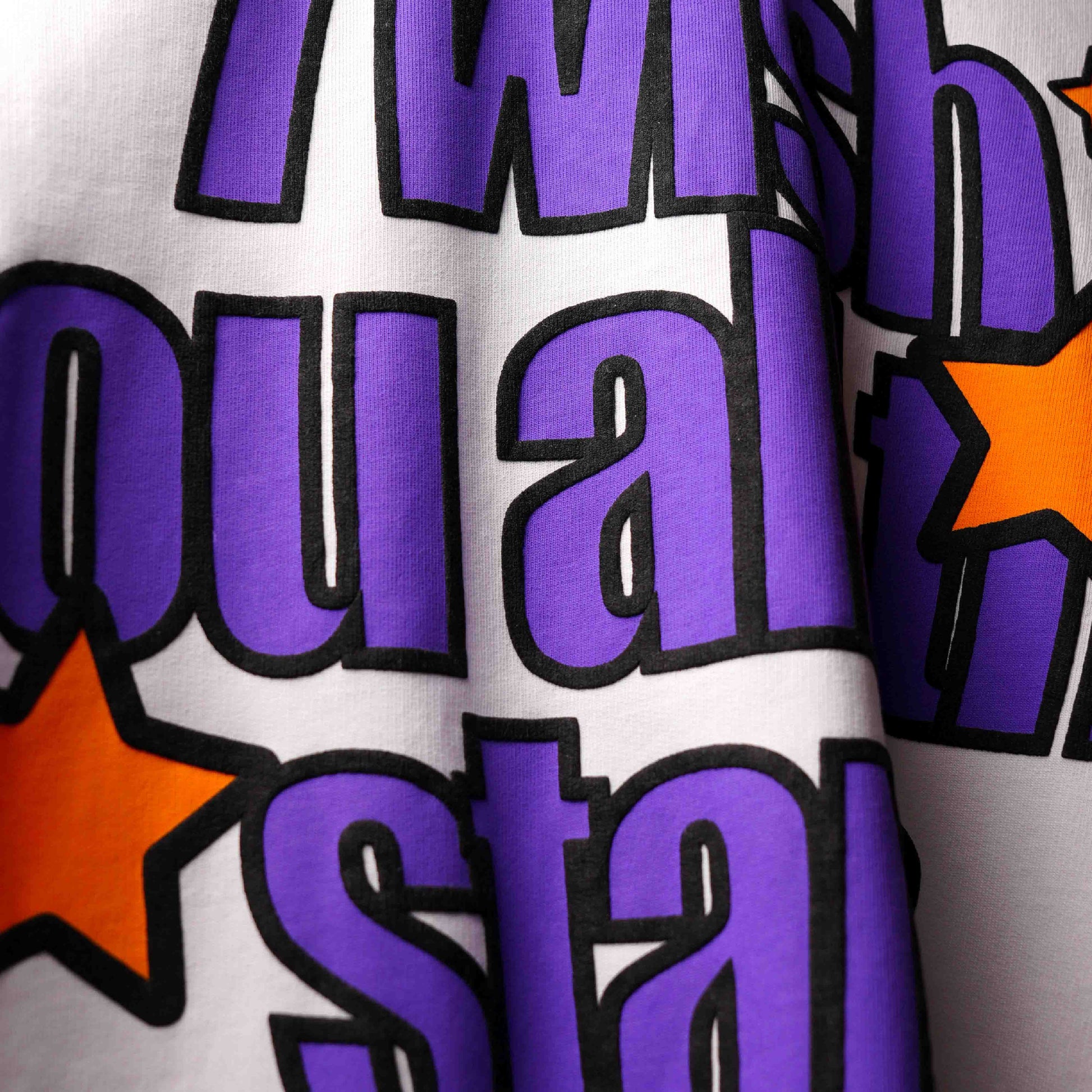 Luxury oversized white t-shirt with star puff branding