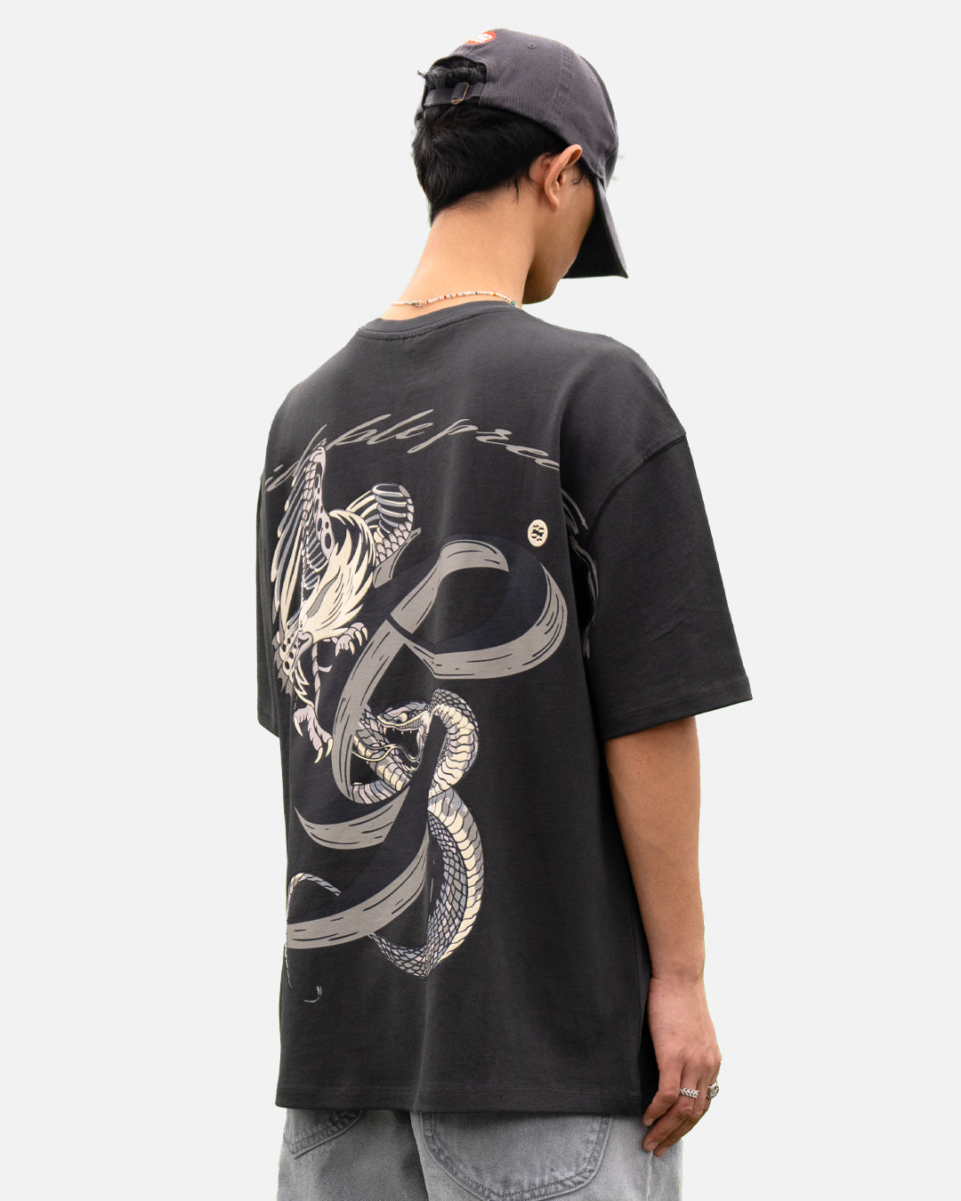 Grey wash oversized t-shirt serpent battle graphic