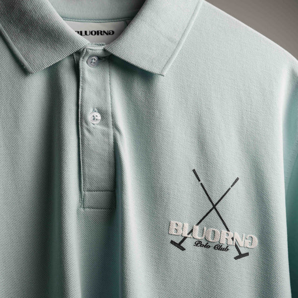 Premium oversized sky-blue polo with puff branding