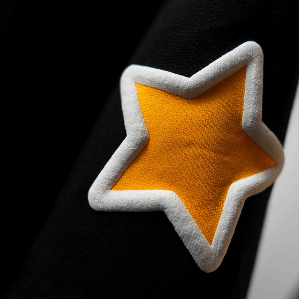 Luxury oversized black t-shirt with star puff design