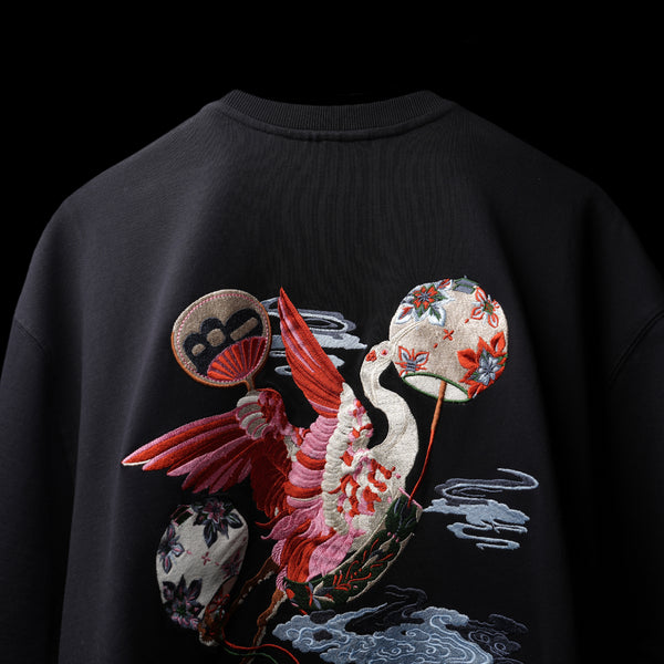 Black premium oversized t-shirt with crane embroidery artwork