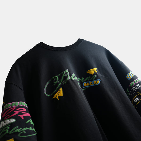 Premium oversized tee with playful sticker slap print