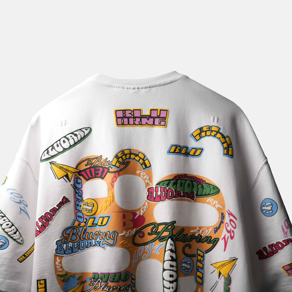 Premium oversized white t-shirt with all-over sticker slap design