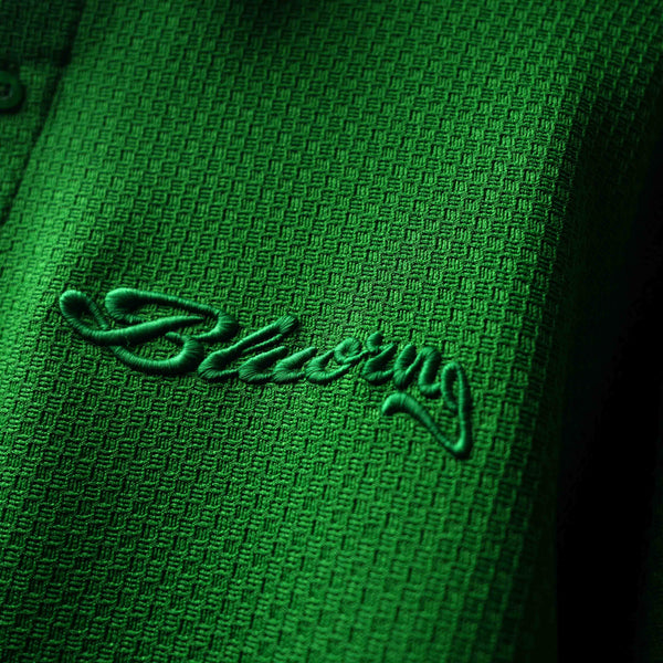 green textured shirt