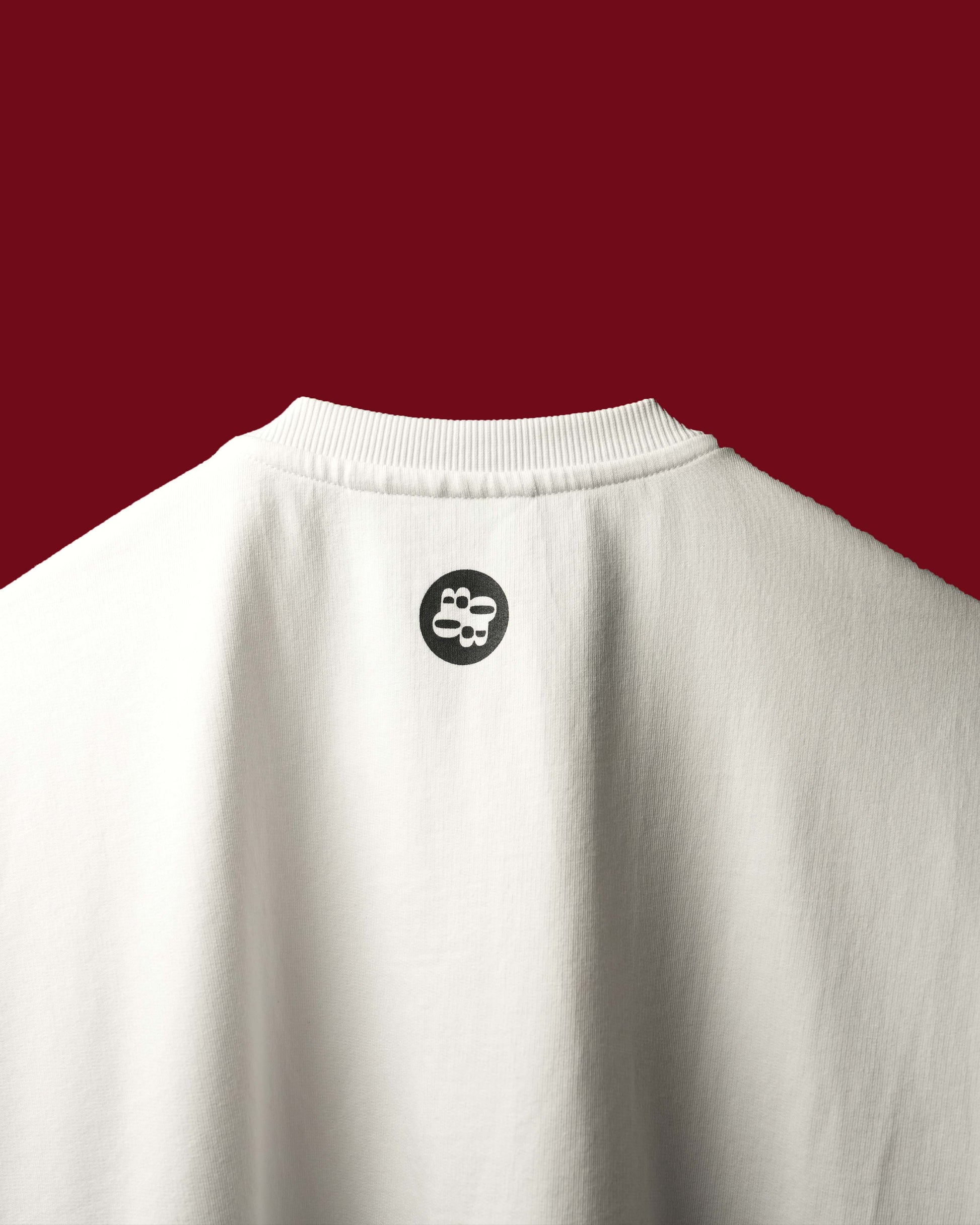 Close-up of the back collar of a white crewneck T-shirt