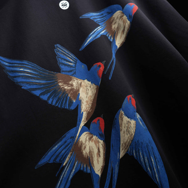 Premium oversized unisex t-shirt with sleek bird-in-flight design