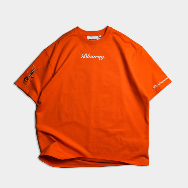 Oversized orange streetwear t-shirt Parliament graphic