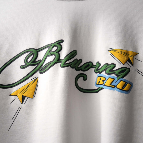 White high-density puff print t-shirt with sticker slap design