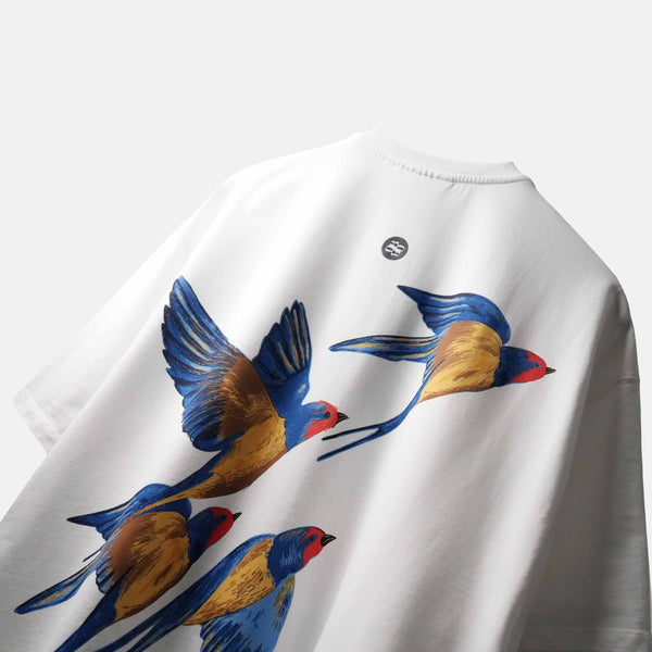 Premium oversized white t-shirt with dynamic bird-in-motion graphic